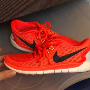 Youth size 3.5 neon orange NIKE free 5.0